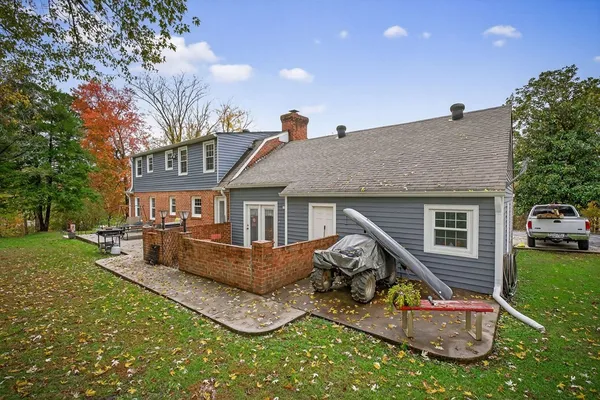 front view of a house with a yard