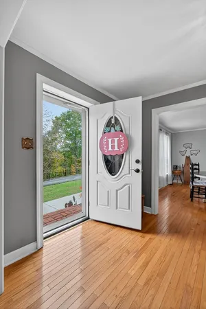 a view of a livingroom with wooden floor