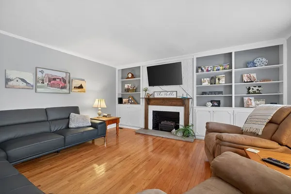 a living room with furniture or fireplace and a flat screen tv