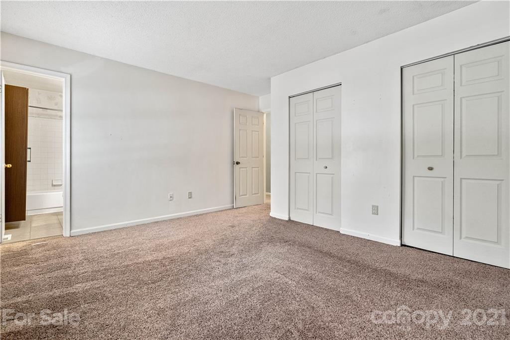 10953 Park Road Charlotte, NC 28226 - Photo 13 of 17 a view of an empty room and closet area