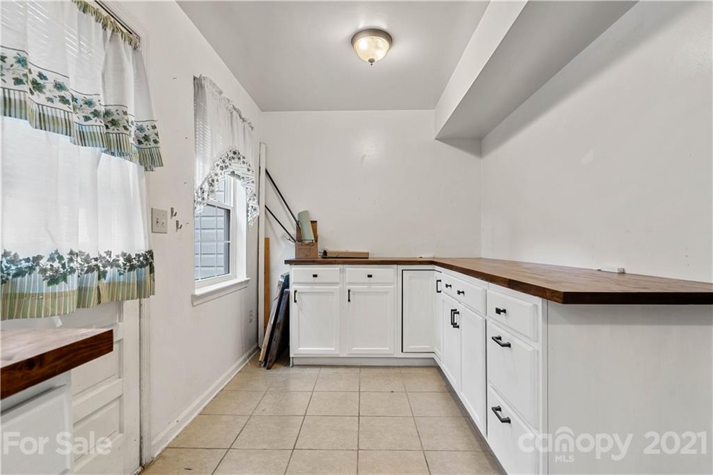 10953 Park Road Charlotte, NC 28226 - Photo 3 of 17 a view of entryway with kitchen