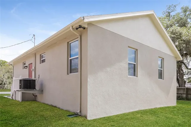 a backyard of a house with seating space