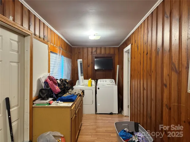 a room with water heater and stairs