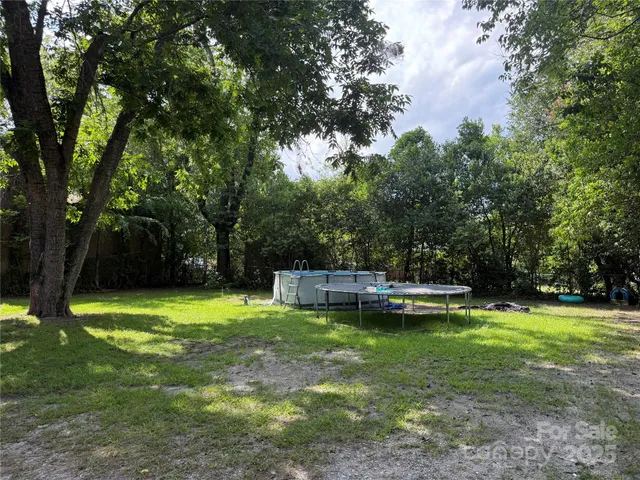 a view of a swimming pool with a garden