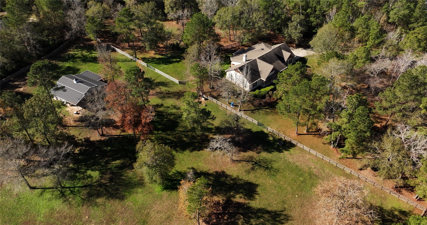 26173 Crown Ranch Boulevard Montgomery, TX 77316 - Photo 12 of 37 an aerial view of residential house with outdoor space and trees all around