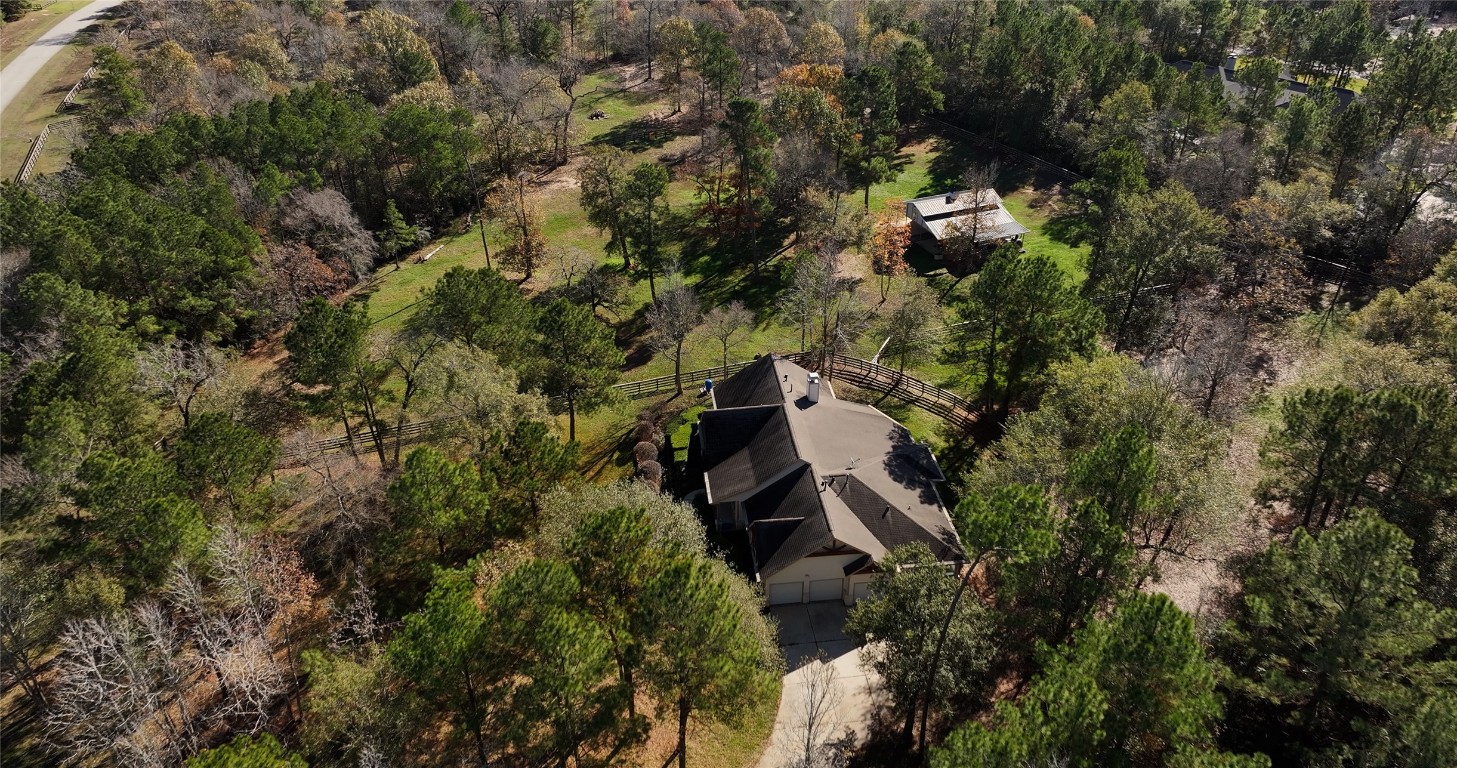 26173 Crown Ranch Boulevard Montgomery, TX 77316 - Photo 13 of 37 an aerial view of a house with yard and outdoor space