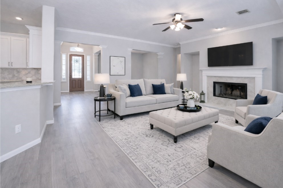 26173 Crown Ranch Boulevard Montgomery, TX 77316 - Photo 29 of 37 a living room with furniture fireplace and a flat screen tv