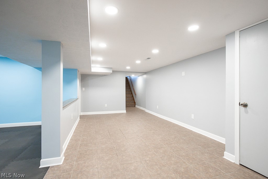 7484 Oberlin Road Elyria, OH 44035 - Photo 18 of 27 Basement with light tile floors