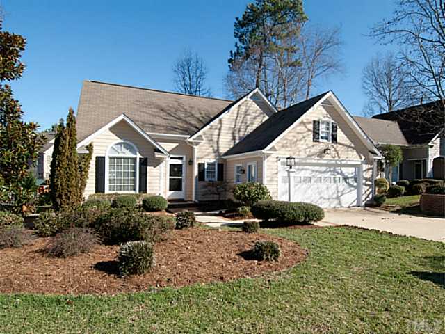 11213 North Radner Way Raleigh, NC 27613 - Photo 1 of 18 a front view of a house with a yard