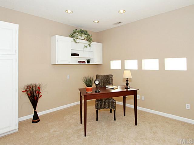 11213 North Radner Way Raleigh, NC 27613 - Photo 13 of 18 a view of a workspace with furniture