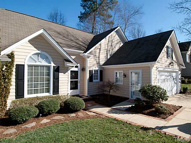 11213 North Radner Way Raleigh, NC 27613 - Photo 2 of 18 a front view of a house with a yard