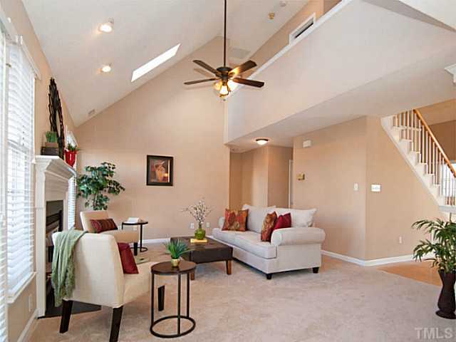 11213 North Radner Way Raleigh, NC 27613 - Photo 3 of 18 a living room with furniture and a flat screen tv