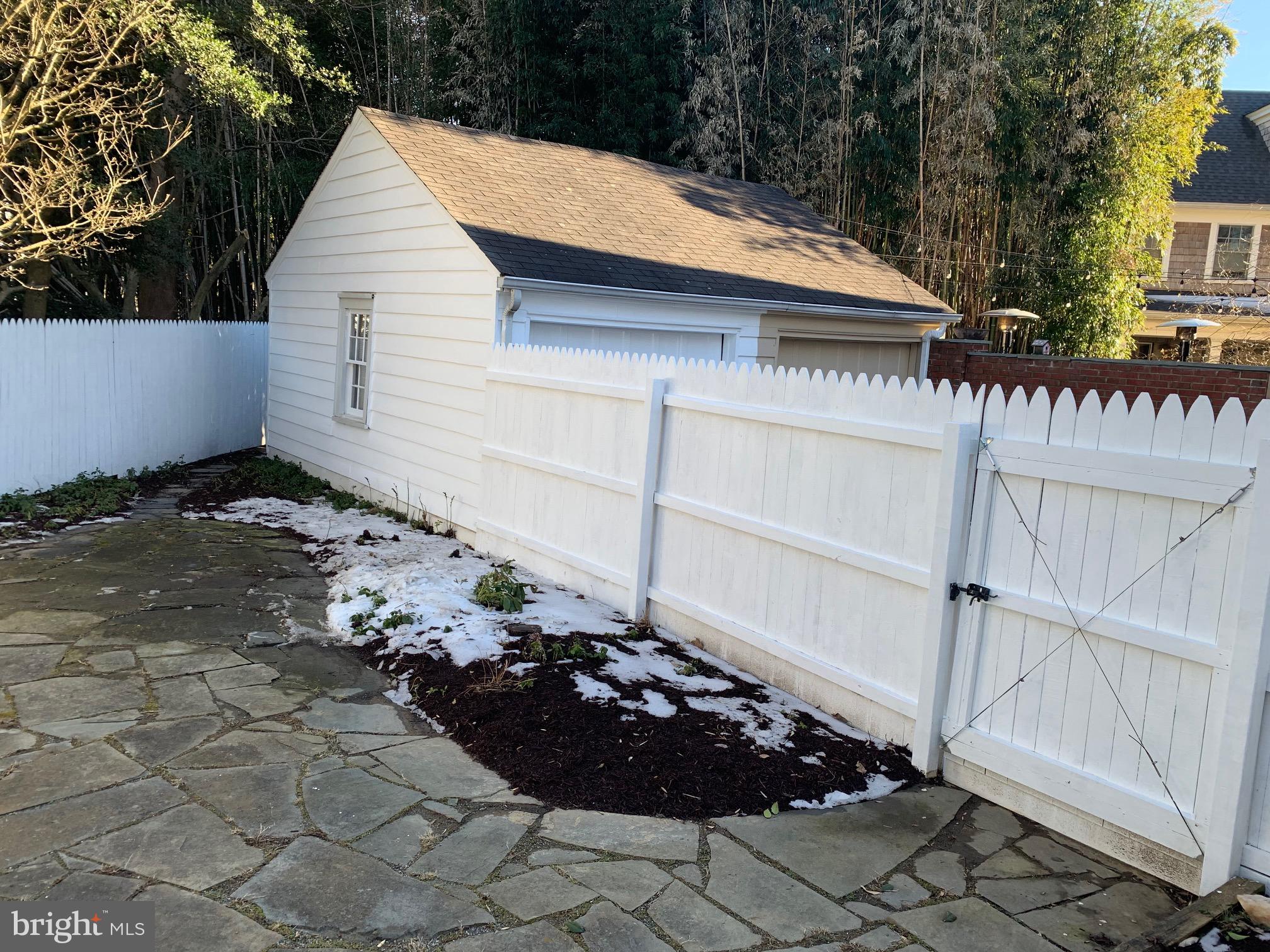 7807 Glenbrook Road Bethesda, MD 20814 - Photo 15 of 25 Picket fence with gate to garage & driveway