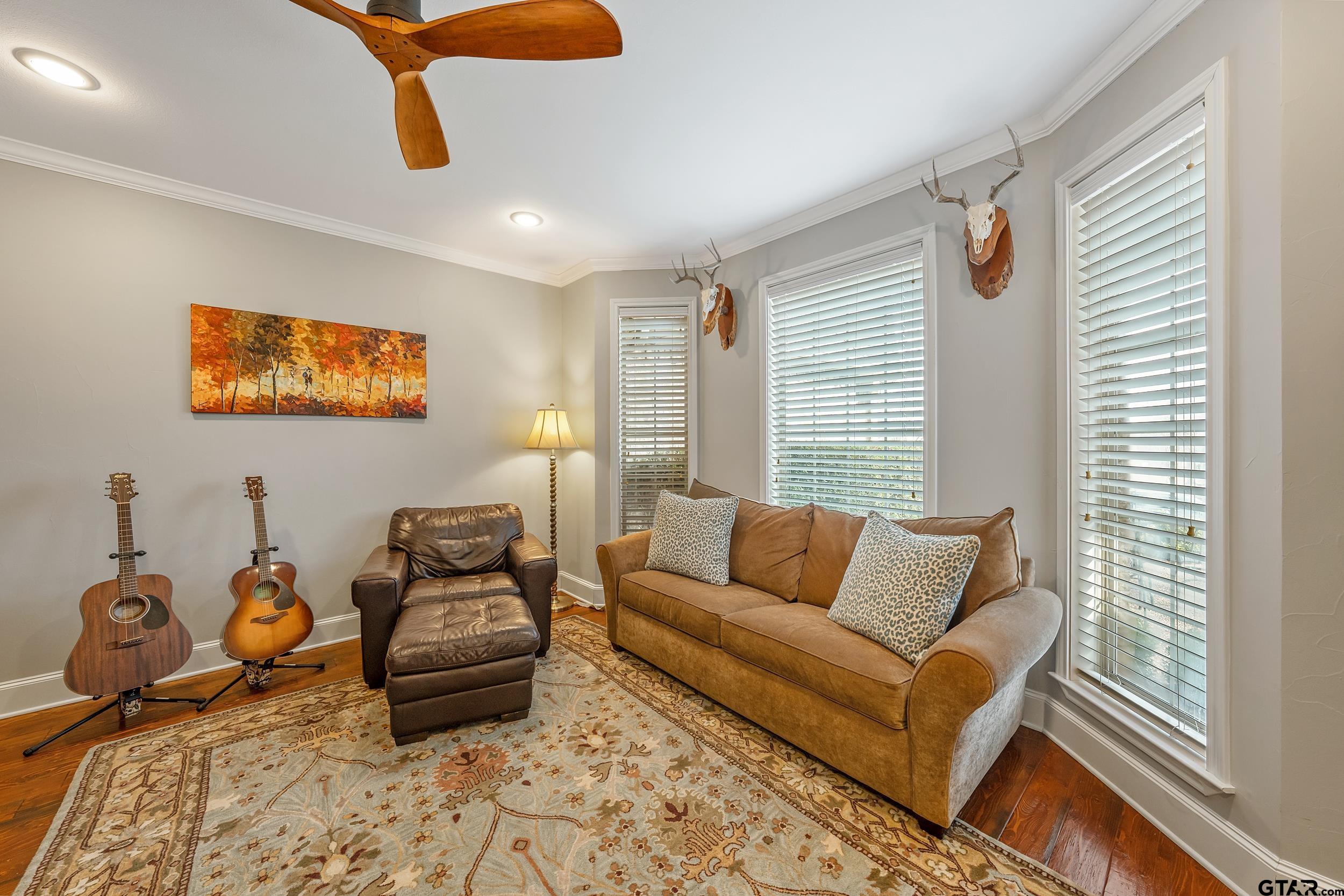 7752 Lamp Post Cove Tyler, TX 75703 - Photo 14 of 41 a living room with furniture a rug and a window