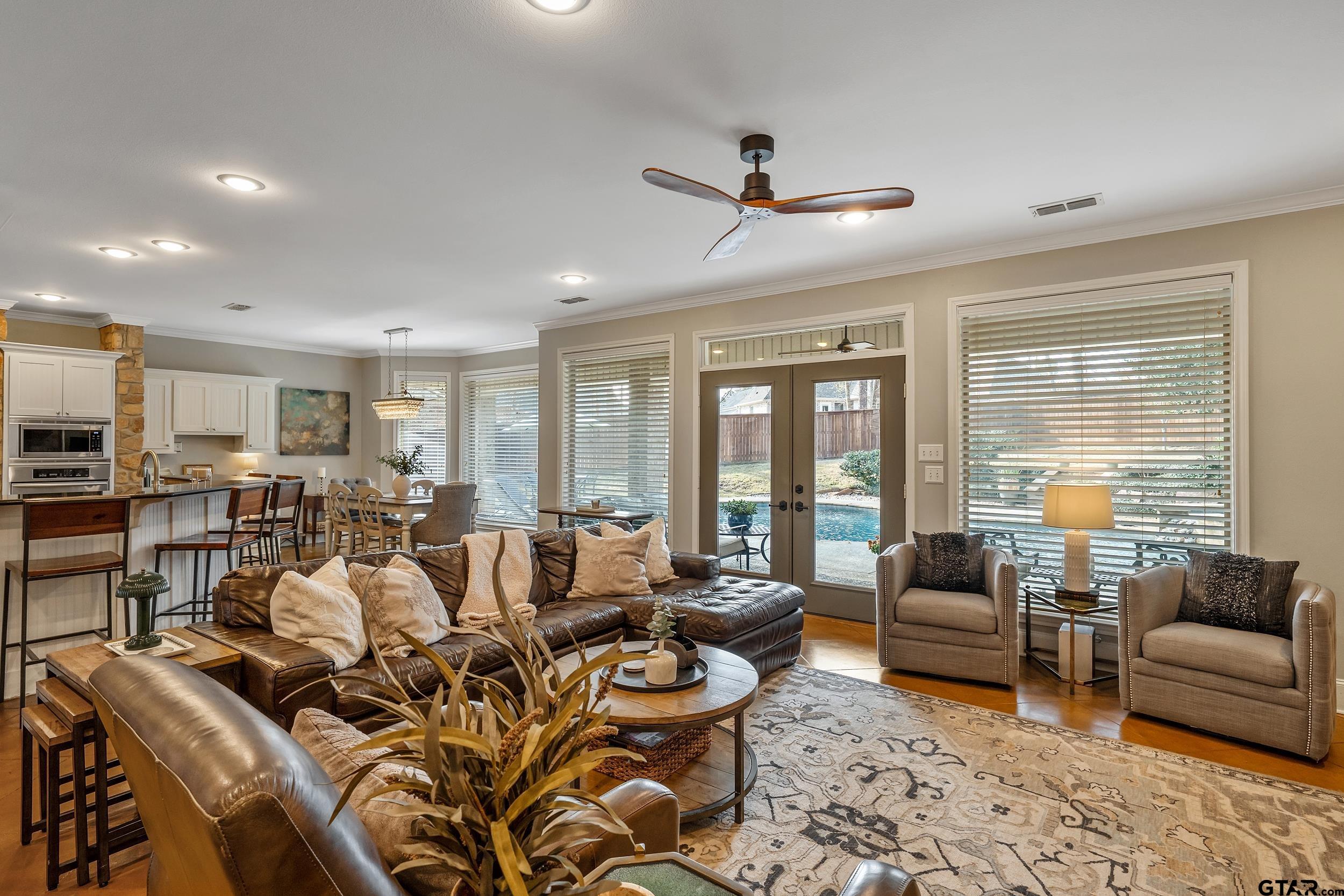 7752 Lamp Post Cove Tyler, TX 75703 - Photo 3 of 41 a living room with furniture and a large window