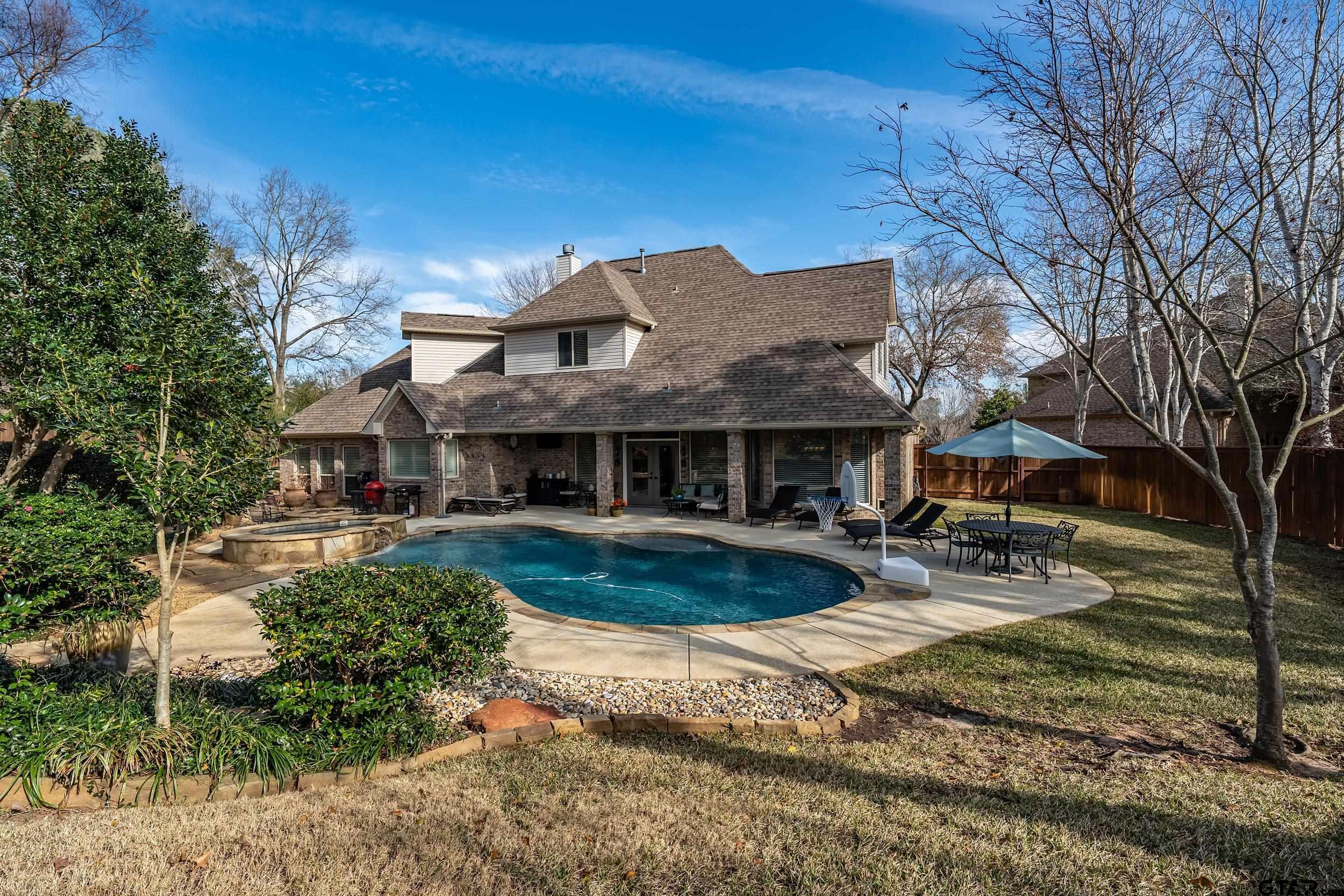 7752 Lamp Post Cove Tyler, TX 75703 - Photo 35 of 41 a front view of a house with garden