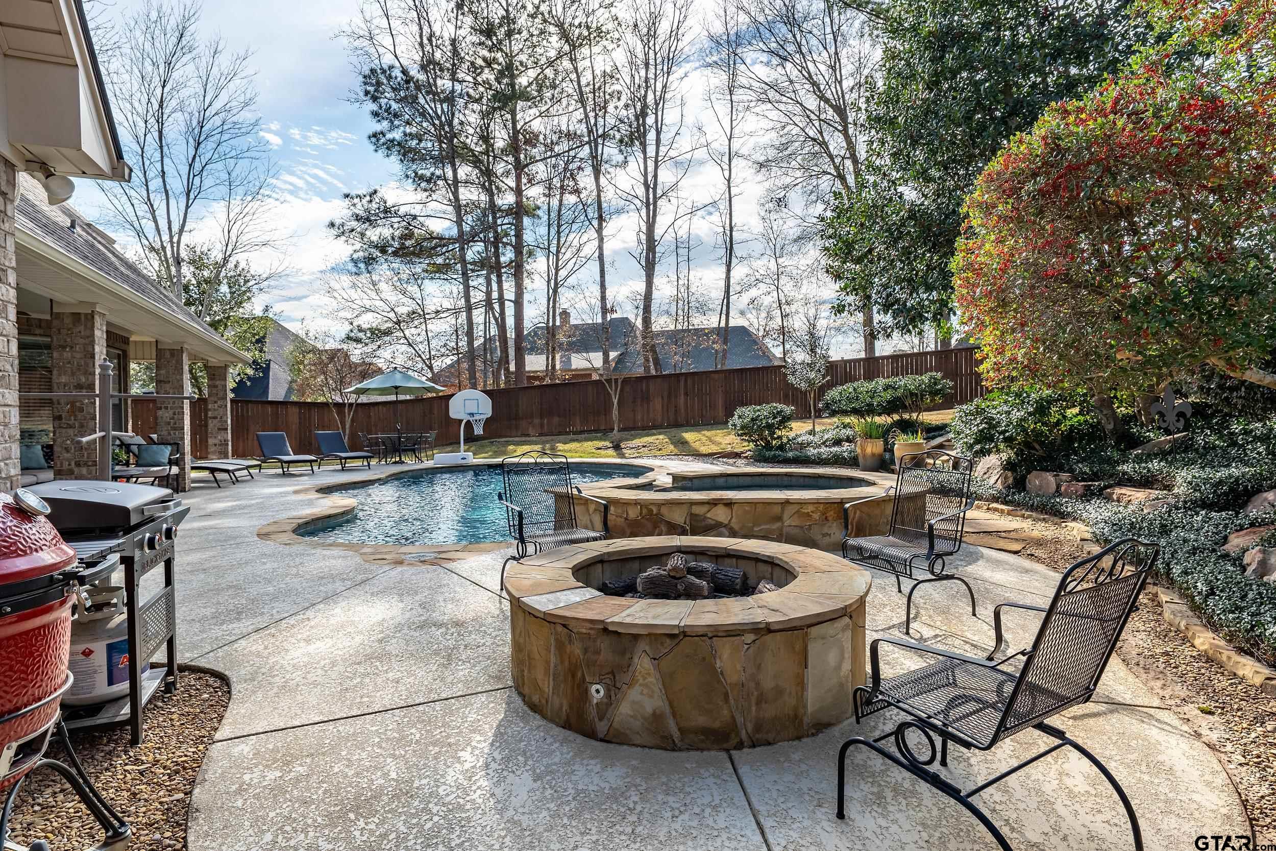7752 Lamp Post Cove Tyler, TX 75703 - Photo 39 of 41 a view of patio with swimming pool and sitting area