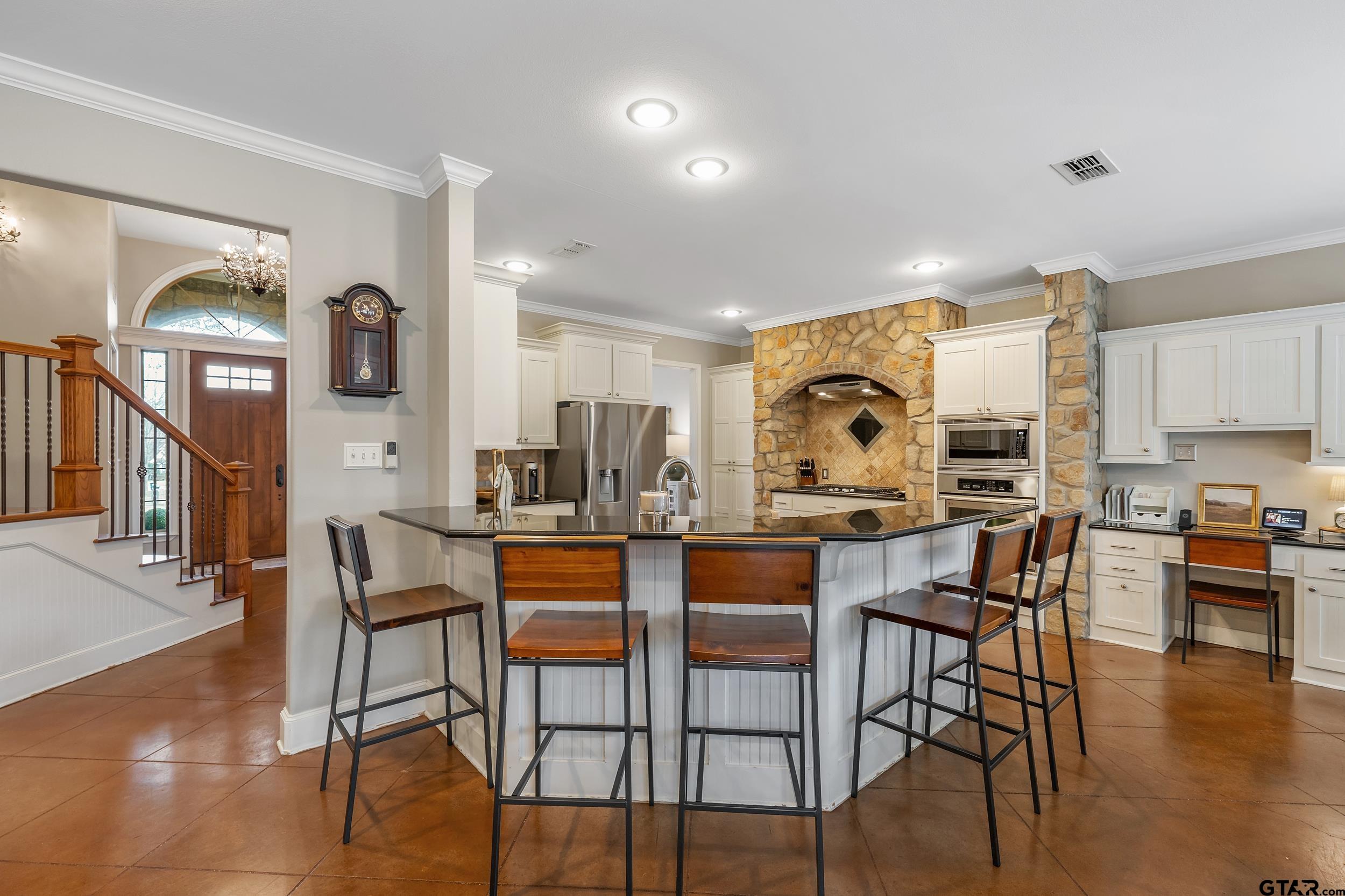7752 Lamp Post Cove Tyler, TX 75703 - Photo 8 of 41 a view of a dining room with furniture and wooden floor
