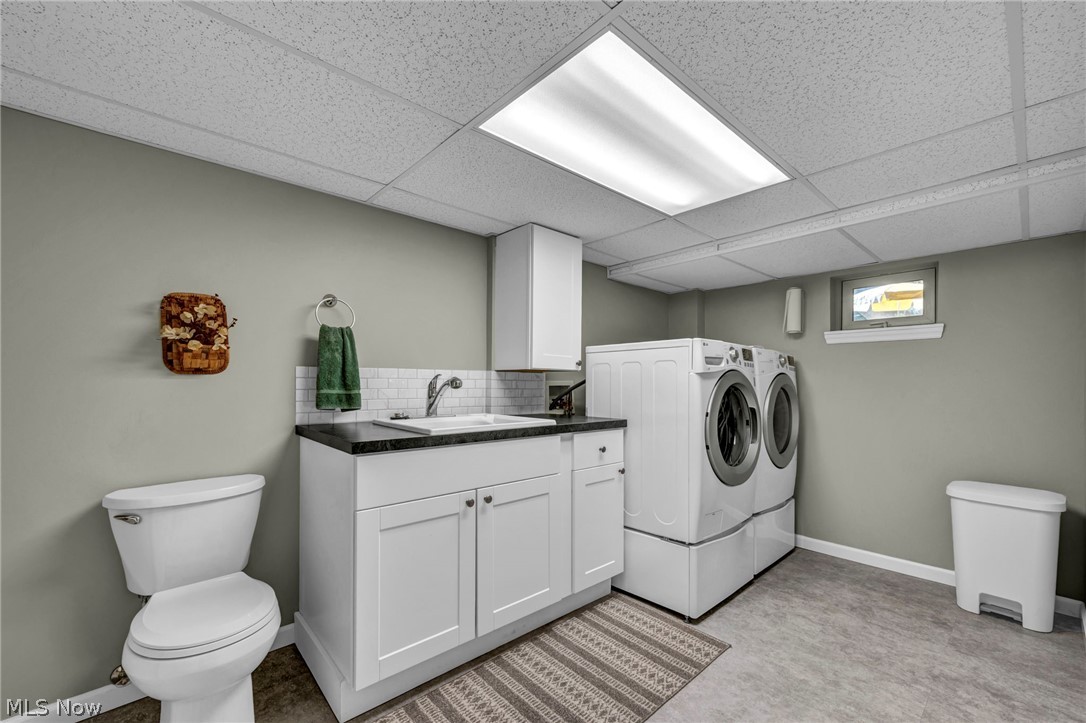1057 Congress Lake Road Mogadore, OH 44260 - Photo 32 of 50 Laundry room and half bathroom in basement