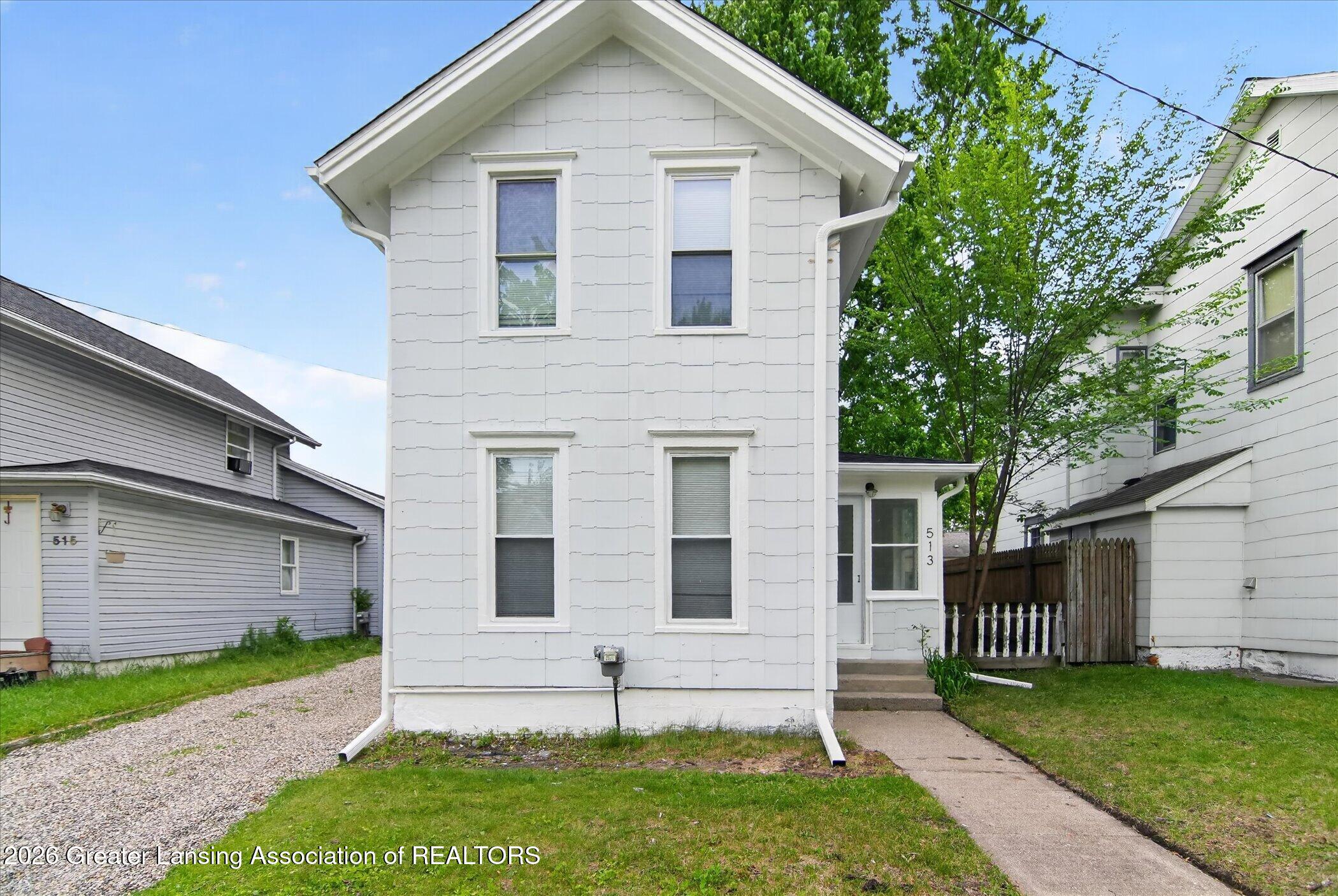 513 North Waterloo Avenue Jackson, MI 49201 - Photo 4 of 40 05-513-N-Waterloo-Ave-WindowStill