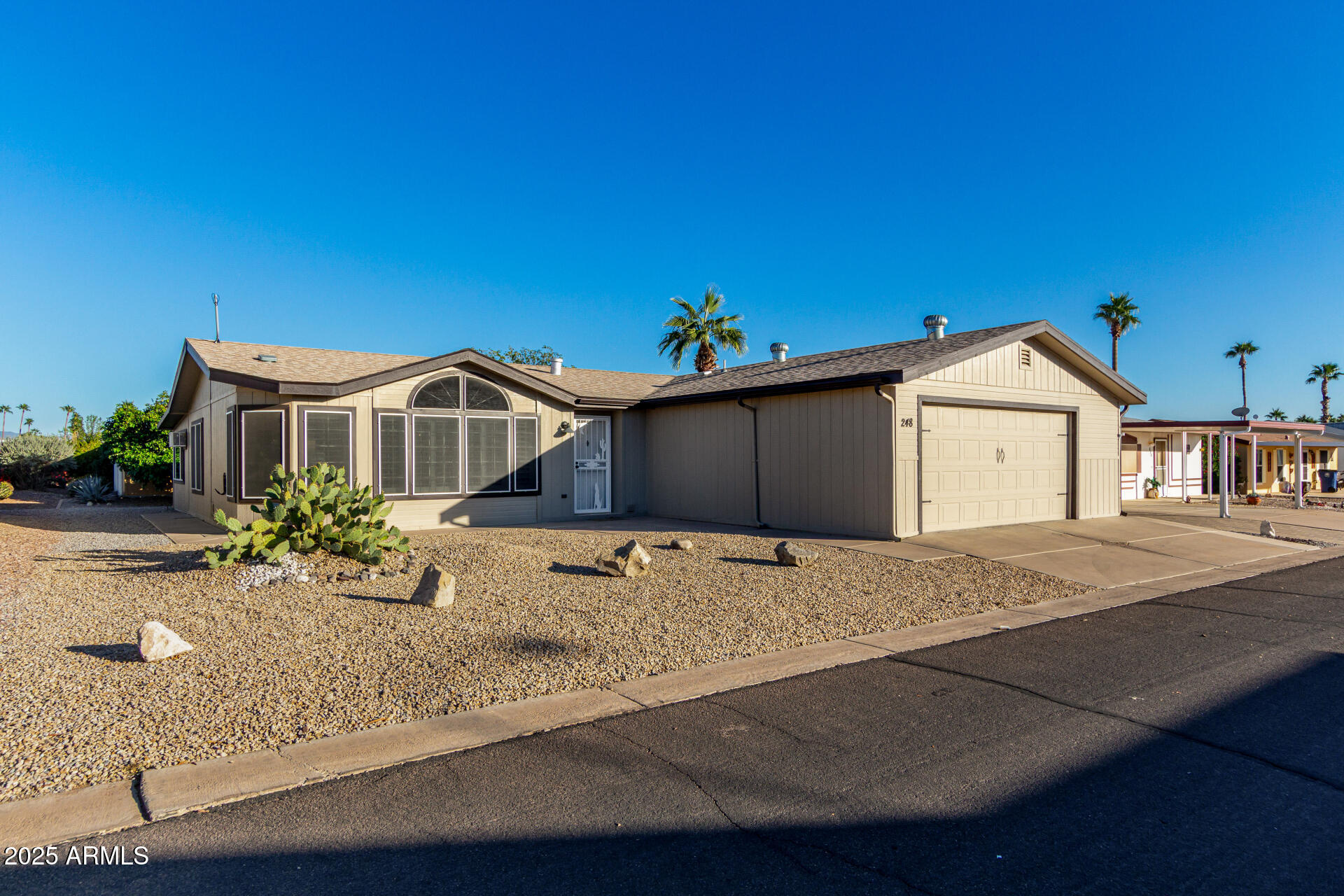 a house view with a garden space