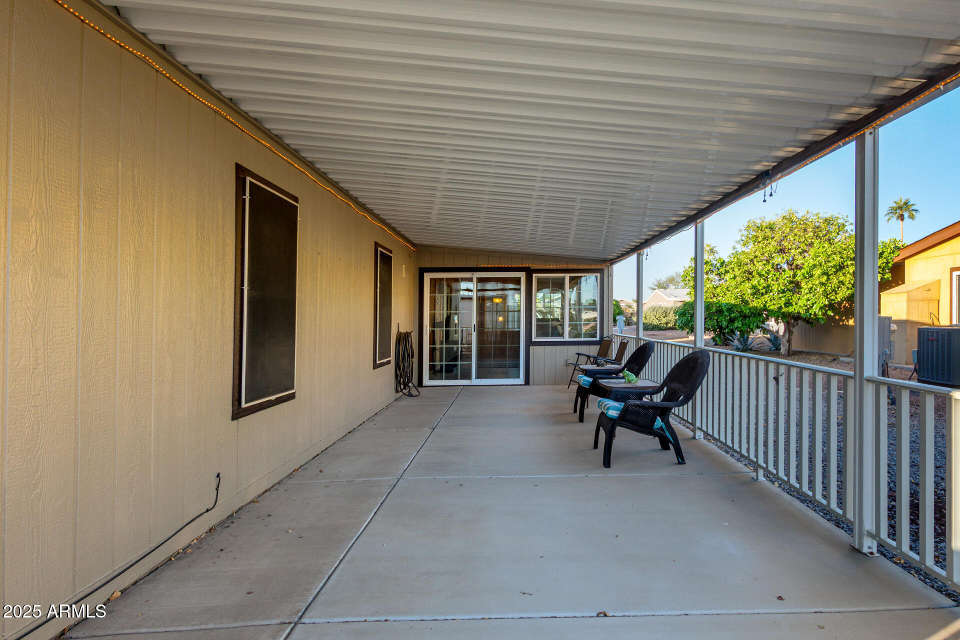 2400 East Baseline Road, Unit 248 Apache Junction, AZ 85119 - Photo 14 of 33 a living room with furniture and a large window