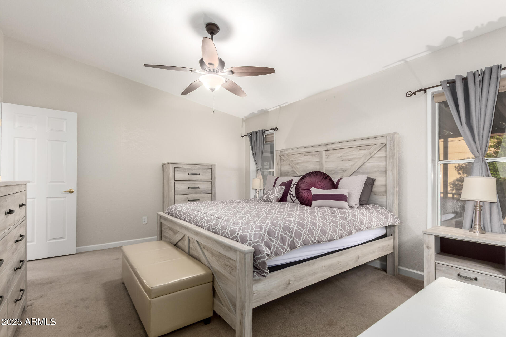 2400 East Baseline Road, Unit 248 Apache Junction, AZ 85119 - Photo 17 of 33 a bedroom with a bed and dresser