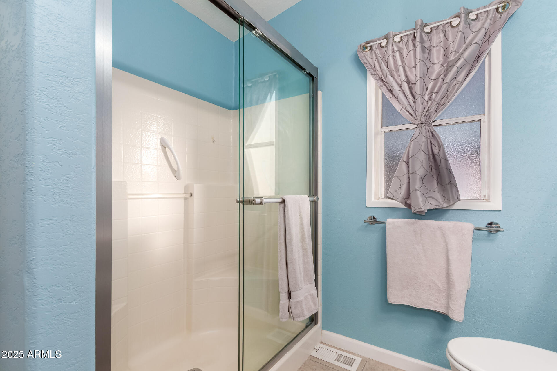 2400 East Baseline Road, Unit 248 Apache Junction, AZ 85119 - Photo 20 of 33 a bathroom with a toilet and a shower