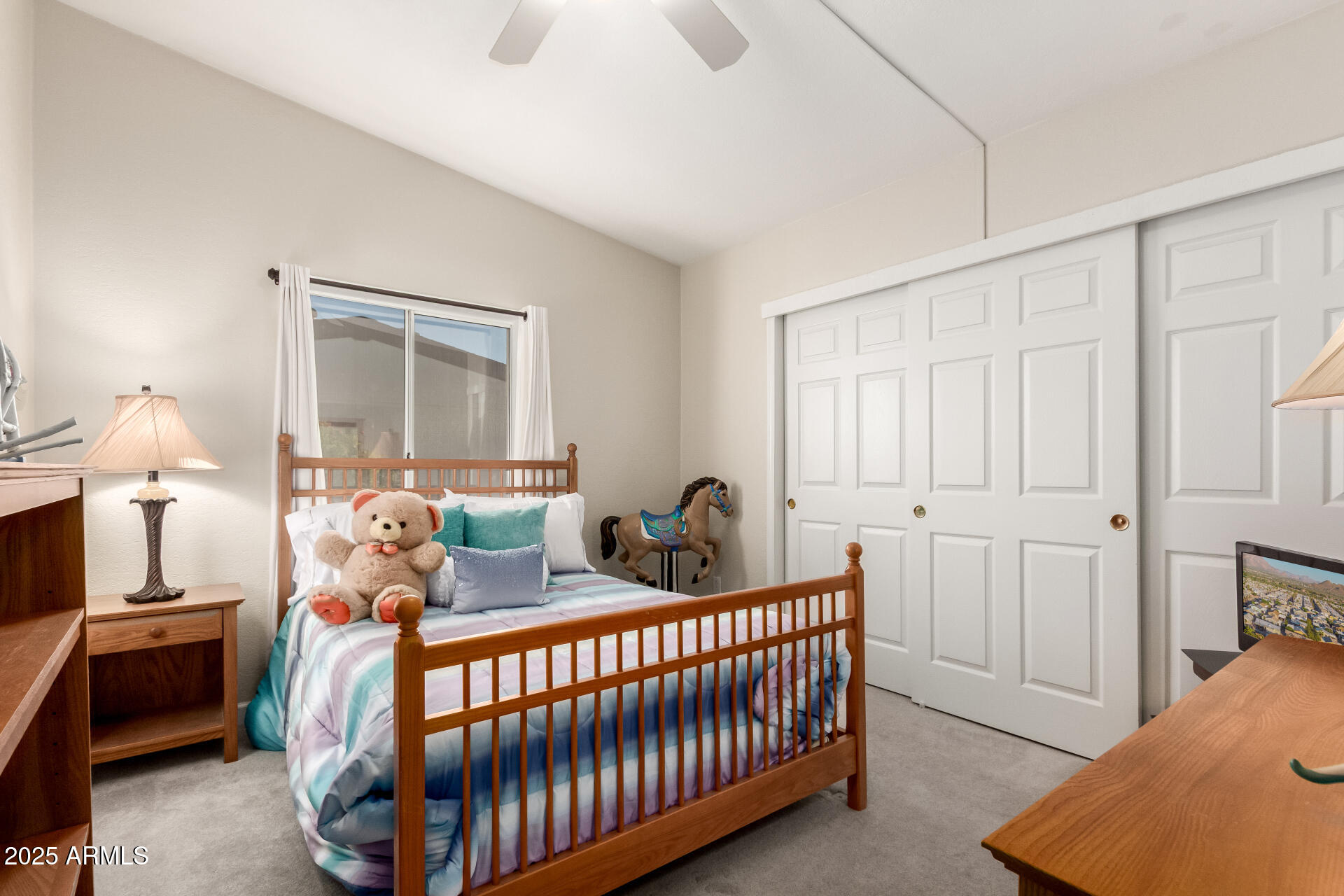 2400 East Baseline Road, Unit 248 Apache Junction, AZ 85119 - Photo 21 of 33 a bedroom with furniture and a window