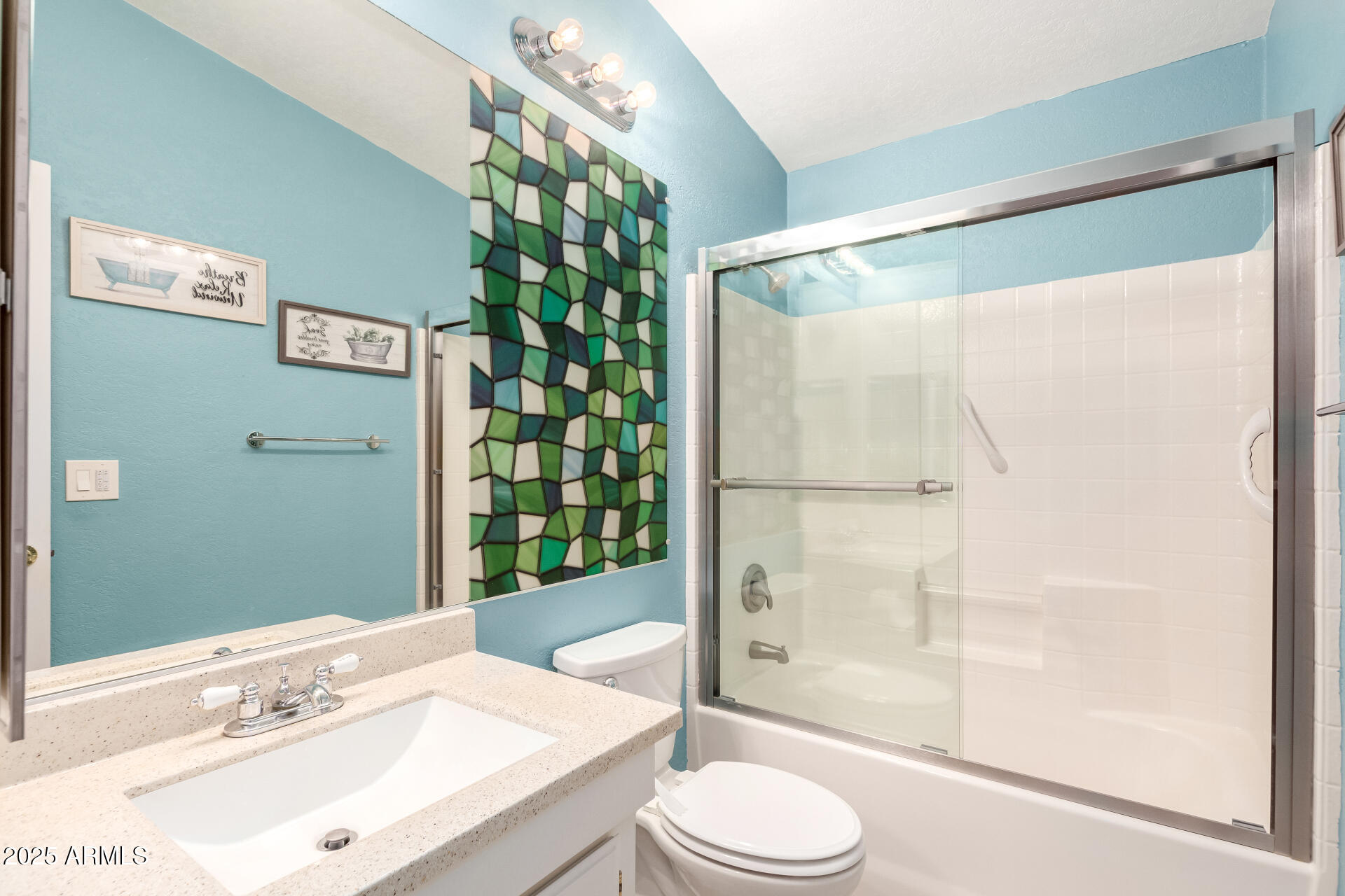 2400 East Baseline Road, Unit 248 Apache Junction, AZ 85119 - Photo 23 of 33 a bathroom with a sink a toilet and shower