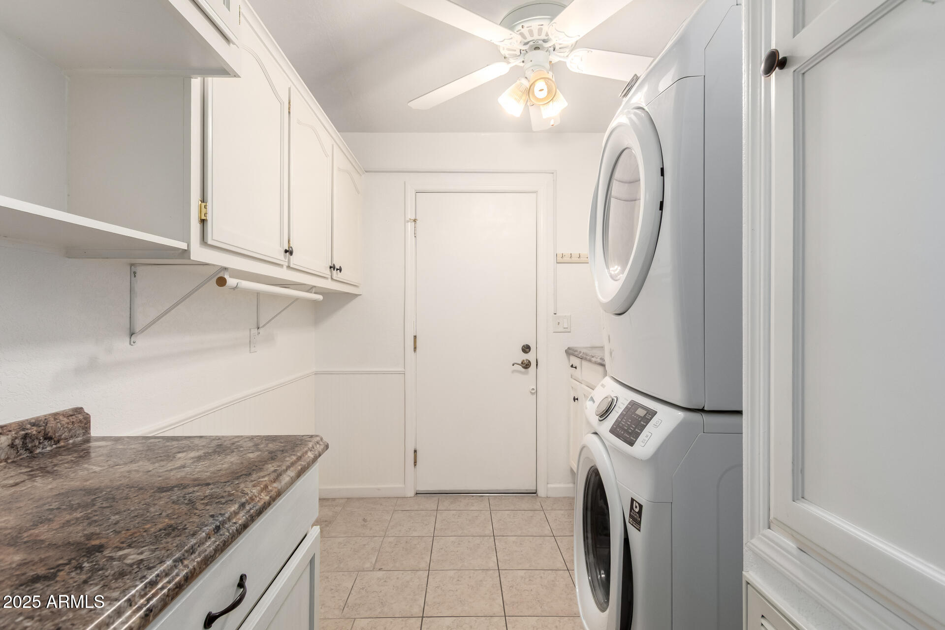 2400 East Baseline Road, Unit 248 Apache Junction, AZ 85119 - Photo 25 of 33 a view of a storage and utility room with washer and dryer