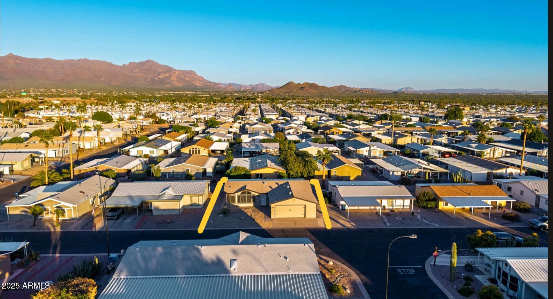 2400 East Baseline Road, Unit 248 Apache Junction, AZ 85119 - Photo 30 of 33 an aerial view of residential houses with outdoor space