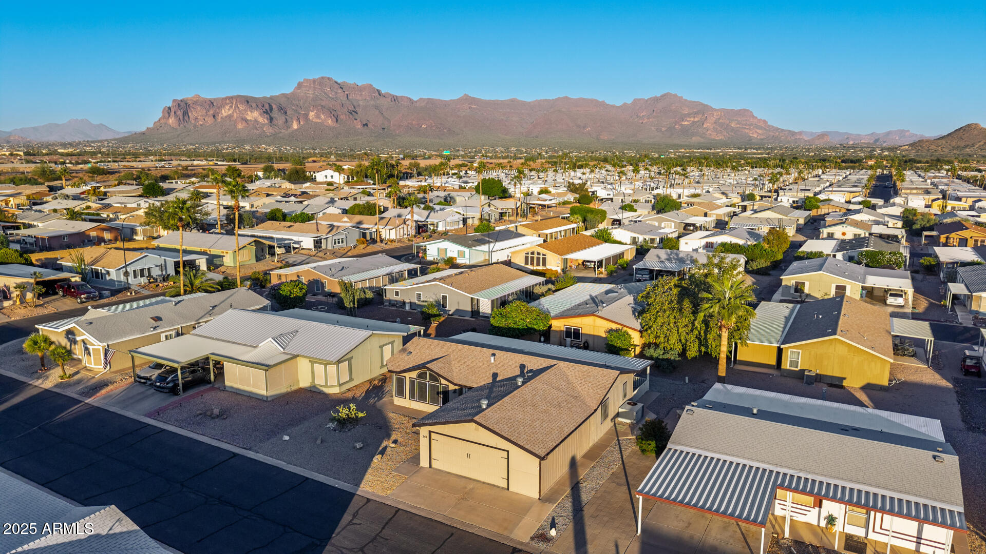 2400 East Baseline Road, Unit 248 Apache Junction, AZ 85119 - Photo 32 of 33 an aerial view of residential houses and outdoor space