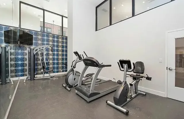 a view of a workspace with furniture