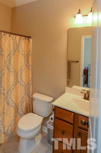 720 Wickham Ridge Road Apex, NC 27539 - Photo 12 of 21 What a nice feature to have a second full bath on the second floor.
