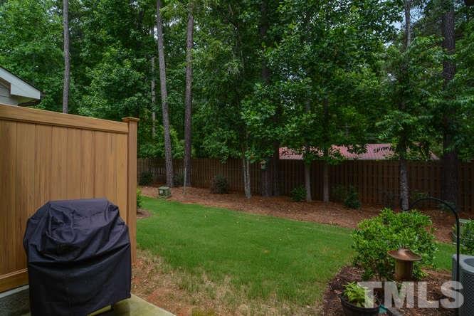 720 Wickham Ridge Road Apex, NC 27539 - Photo 14 of 21 You will love the backyard space that this town home offers. What a nice place for outdoor entertaining.
