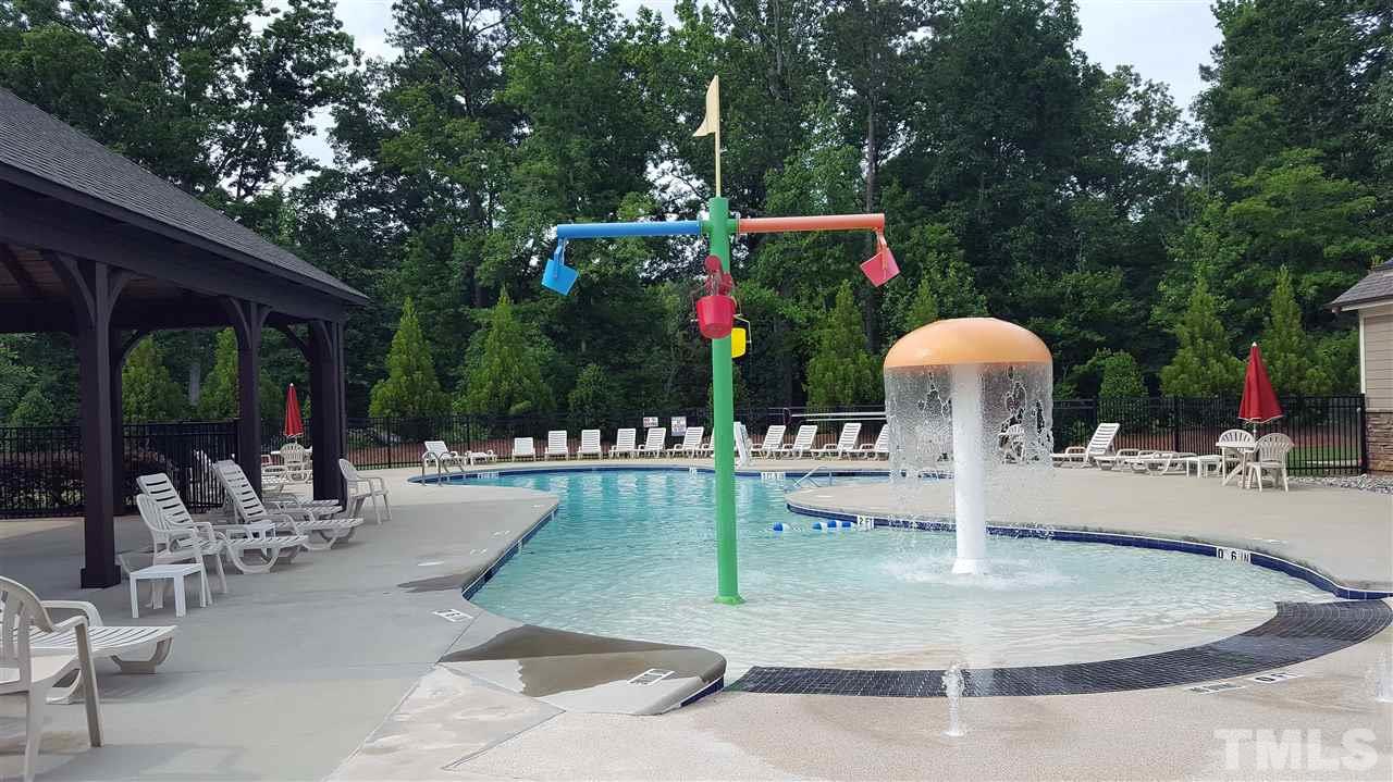 720 Wickham Ridge Road Apex, NC 27539 - Photo 18 of 21 The community pool will be a great place to meet your neighbors and relax during the summer.
