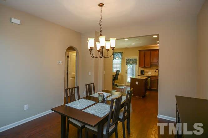720 Wickham Ridge Road Apex, NC 27539 - Photo 4 of 21 The formal dining room is large and has plenty of room for furniture.