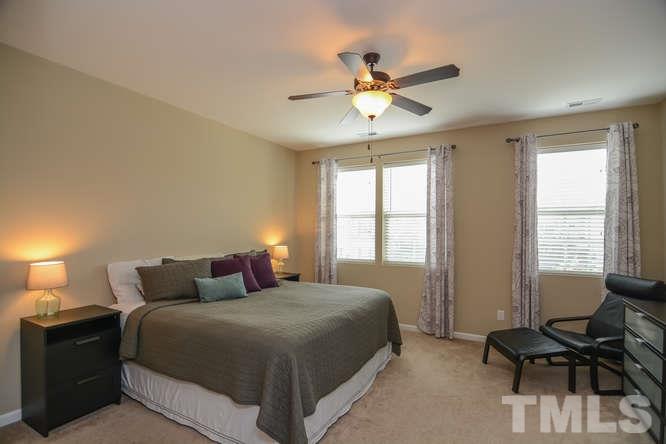 720 Wickham Ridge Road Apex, NC 27539 - Photo 8 of 21 The windows in the master bedroom suite fill this room with lots of natural light. The master is nicely sized and has an attached full bath.
