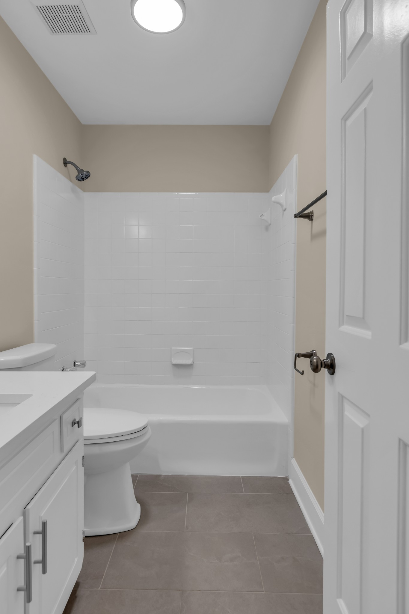 1205 General George Patton Road Nashville, TN 37221 - Photo 19 of 32 a bathroom with a toilet sink and a bathtub
