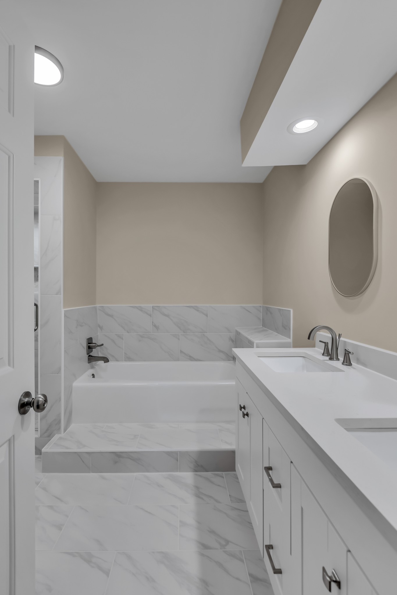 1205 General George Patton Road Nashville, TN 37221 - Photo 22 of 32 a bathroom with a bathtub and a sink