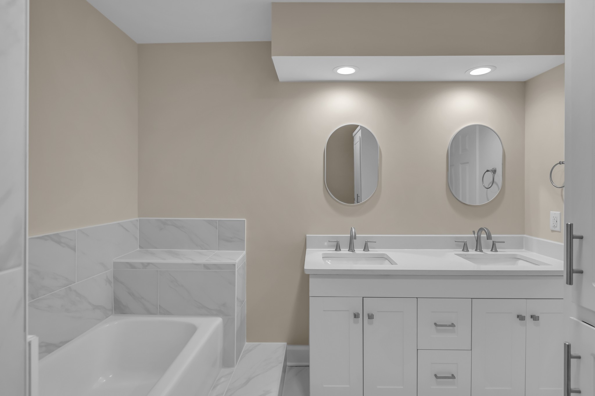 1205 General George Patton Road Nashville, TN 37221 - Photo 23 of 32 a bathroom with 2 sink double vanity and a mirror