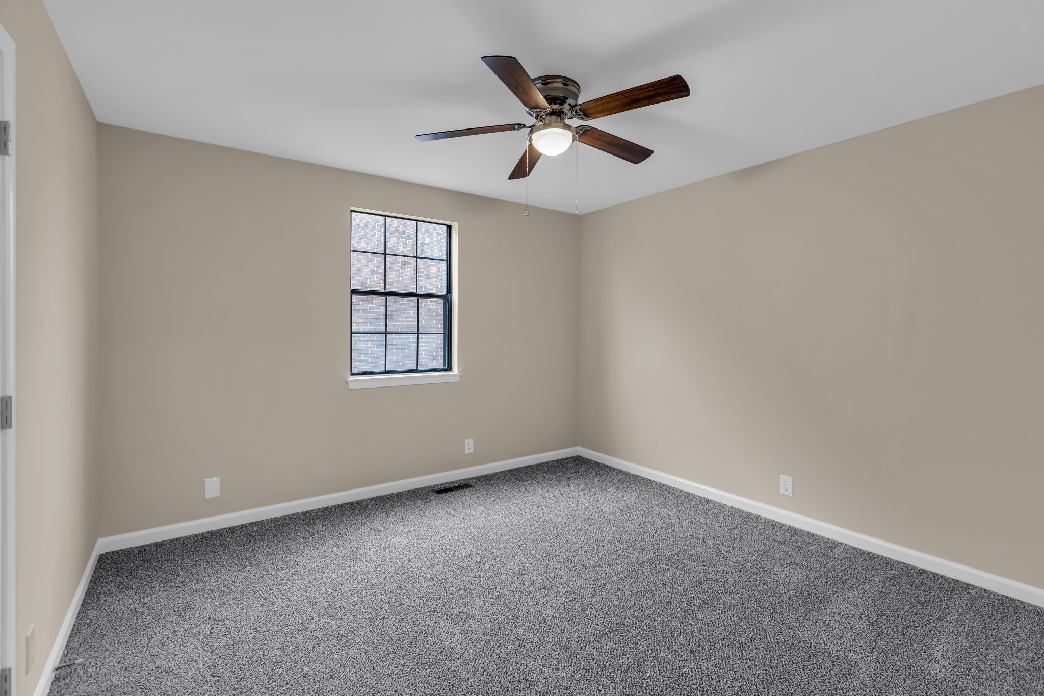 1205 General George Patton Road Nashville, TN 37221 - Photo 26 of 32 an empty room with windows and ceiling fan