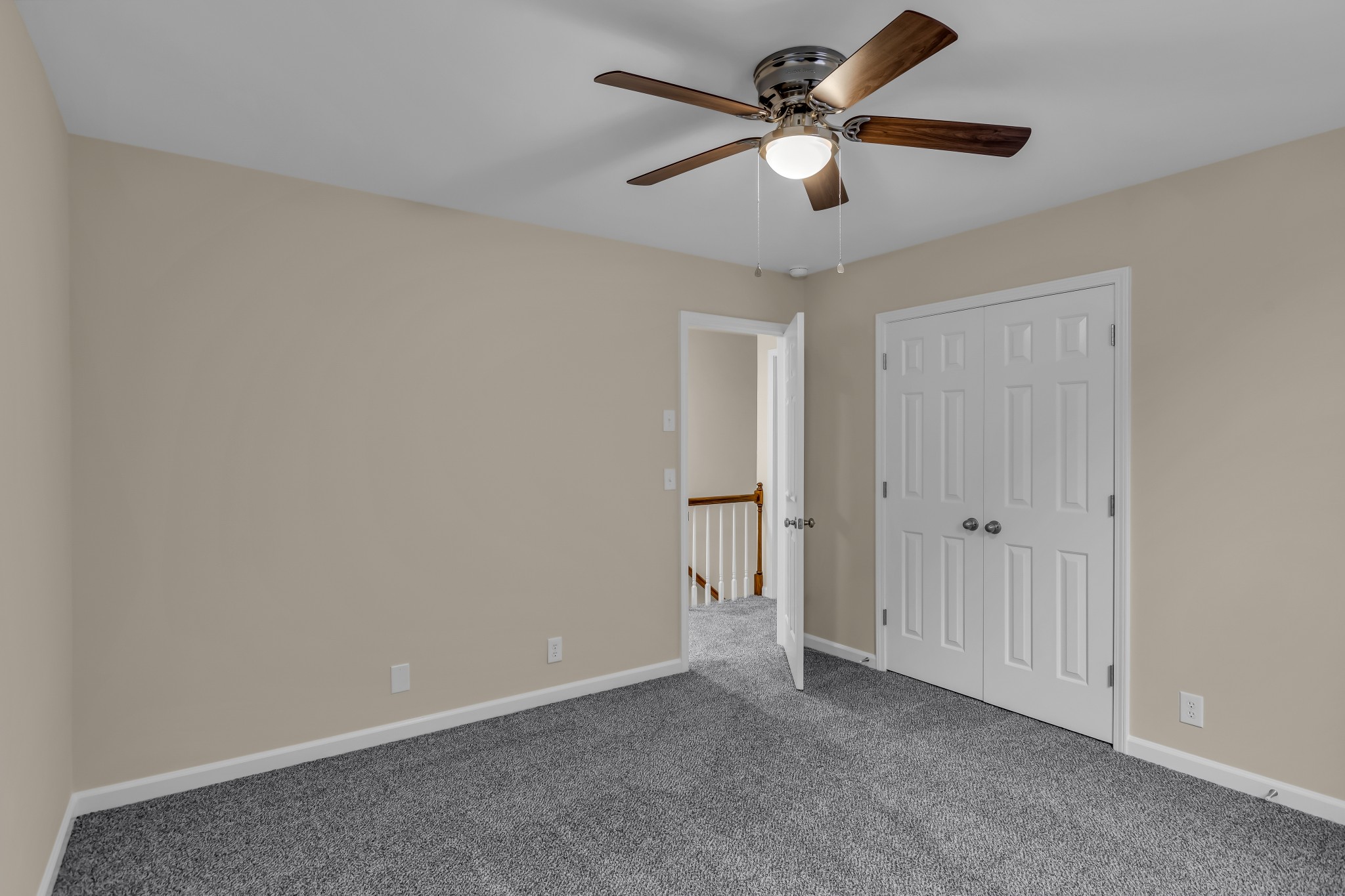 1205 General George Patton Road Nashville, TN 37221 - Photo 27 of 32 an empty room with closet and a ceiling fan
