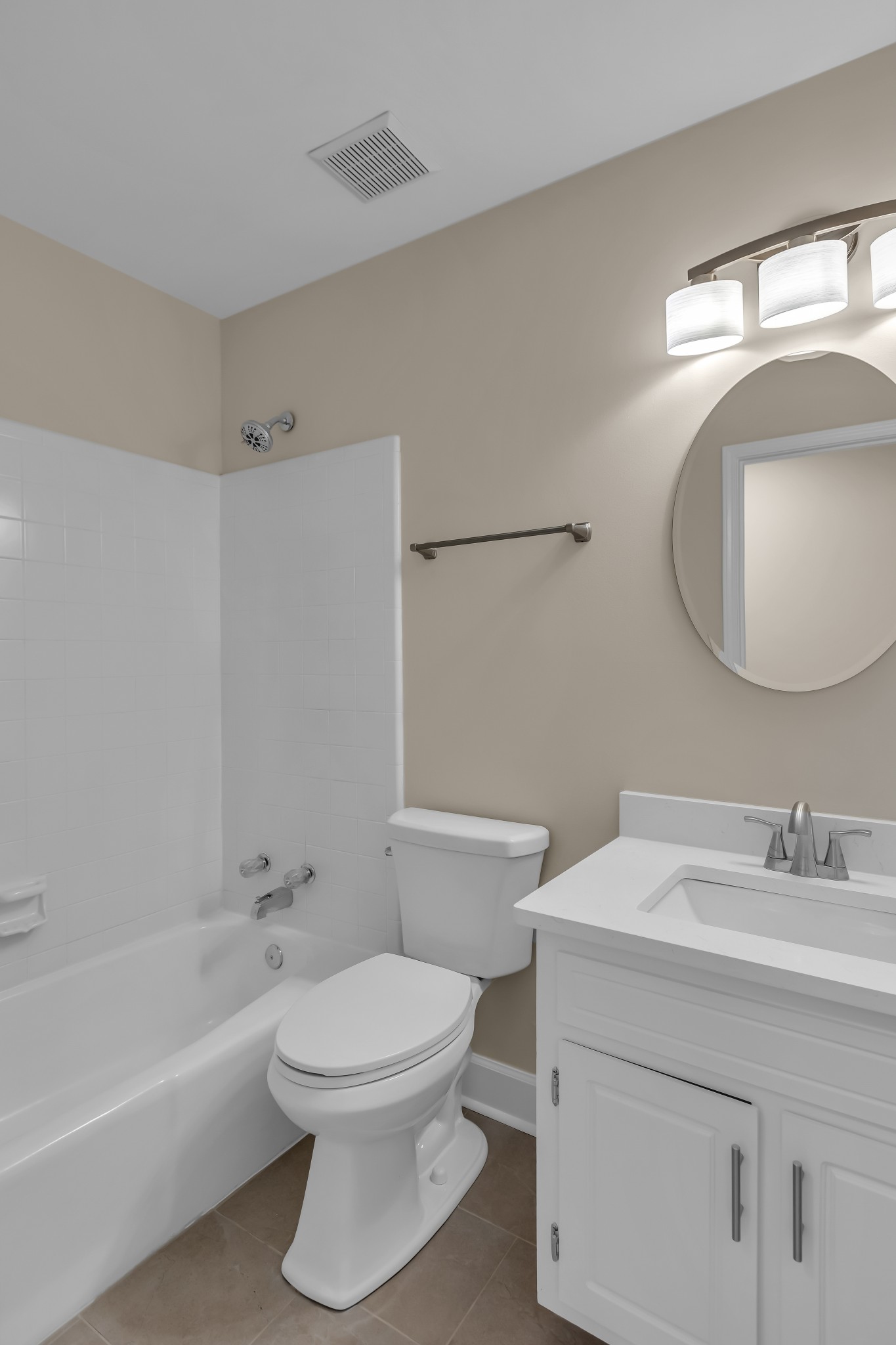 1205 General George Patton Road Nashville, TN 37221 - Photo 29 of 32 a bathroom with a toilet sink vanity tub and mirror