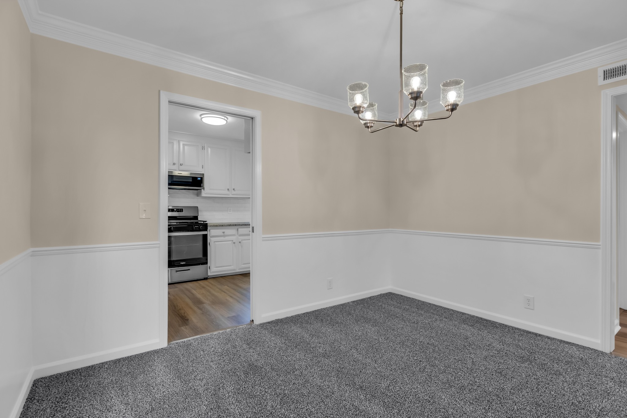 1205 General George Patton Road Nashville, TN 37221 - Photo 8 of 32 a view of a kitchen with a sink and a stove