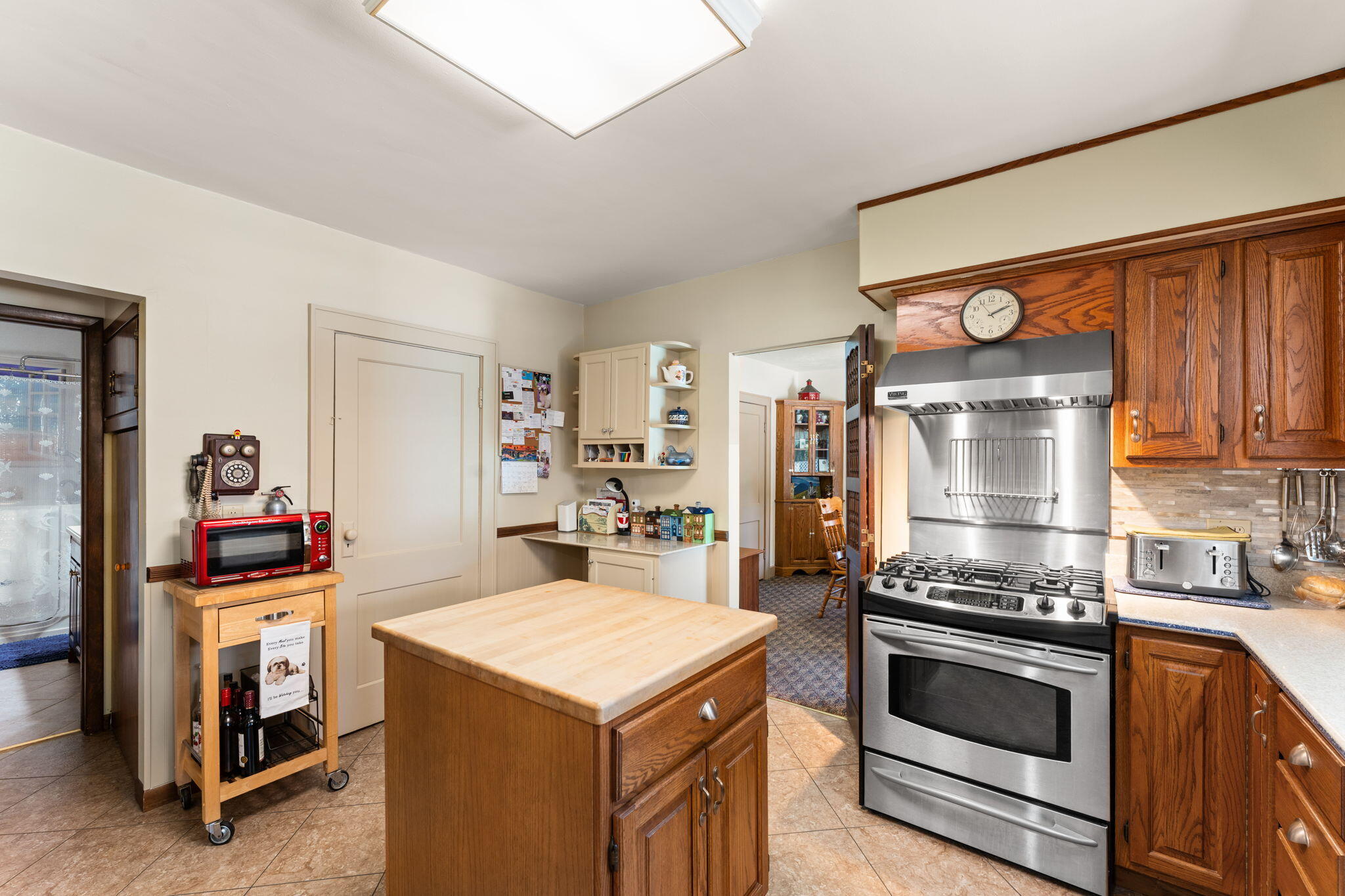 138 McClung Road La Porte, IN 46350 - Photo 9 of 50 a kitchen with a stove and a microwave