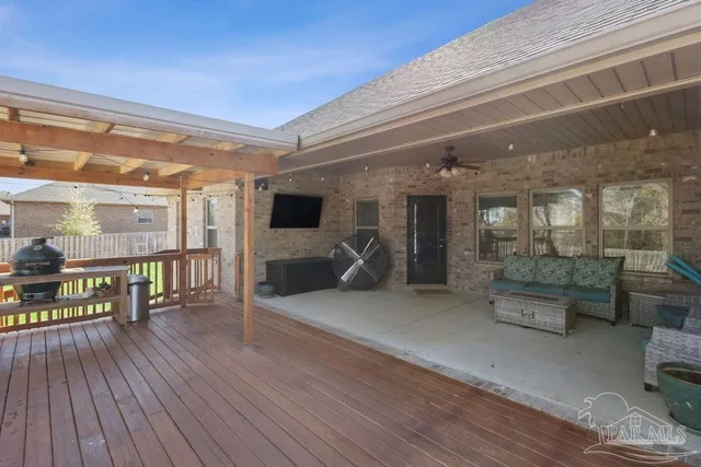 a lobby with furniture and wooden floor