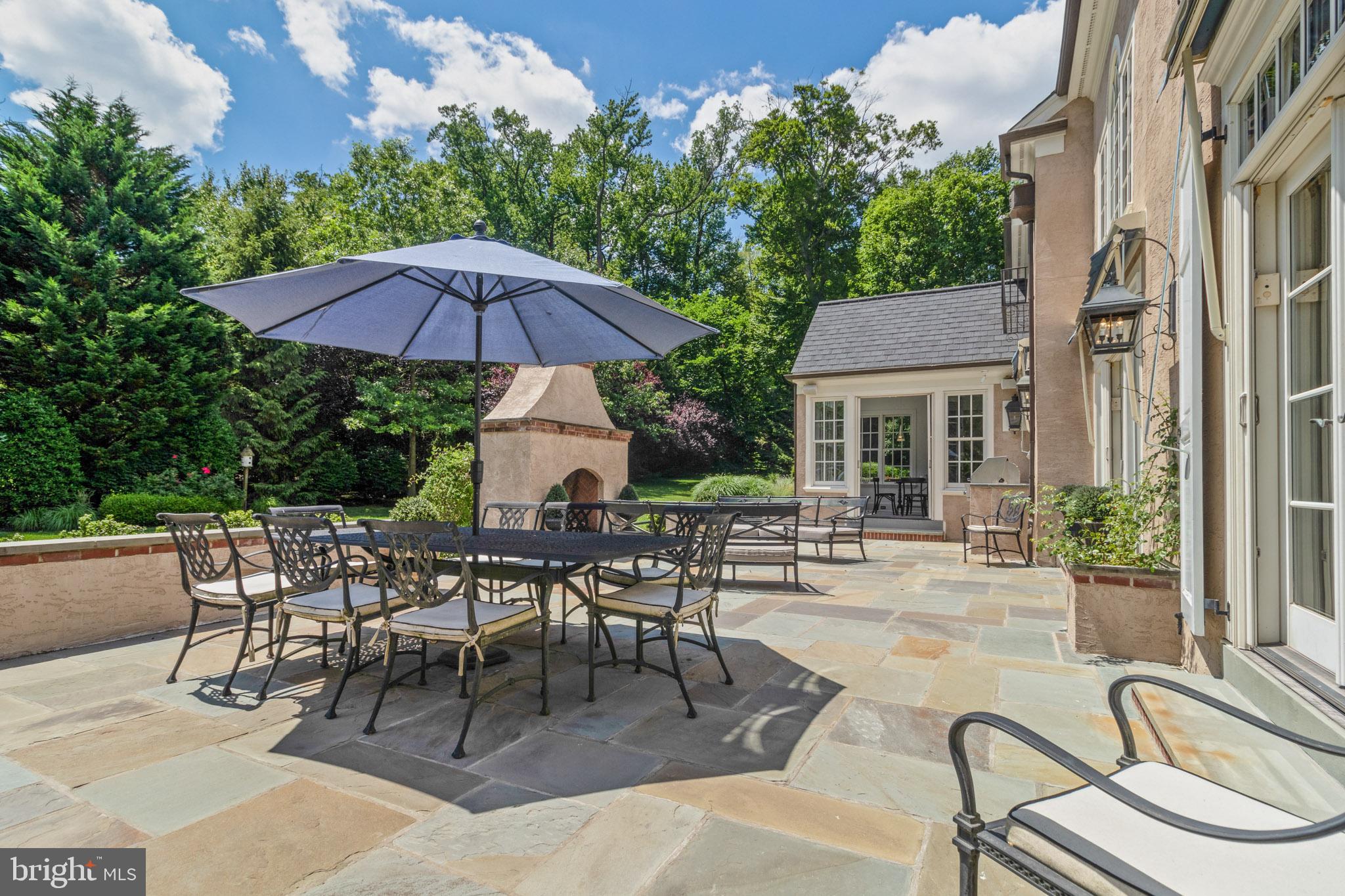 785 Harrison Road Villanova, PA 19085 - Photo 32 of 41 Large Flagstone Patio with Gas Fireplace