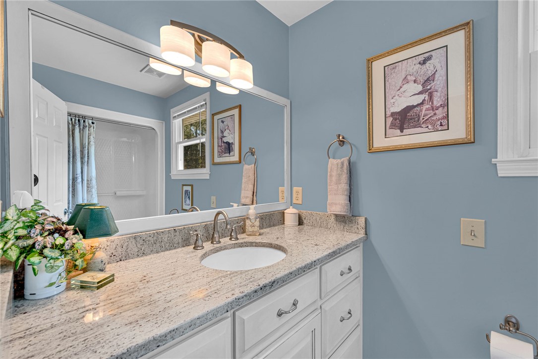 1010 Ridgeview Drive Pendleton, SC 29670 - Photo 29 of 47 This bright bathroom features a spacious vanity with elegant countertops and a convenient shower.